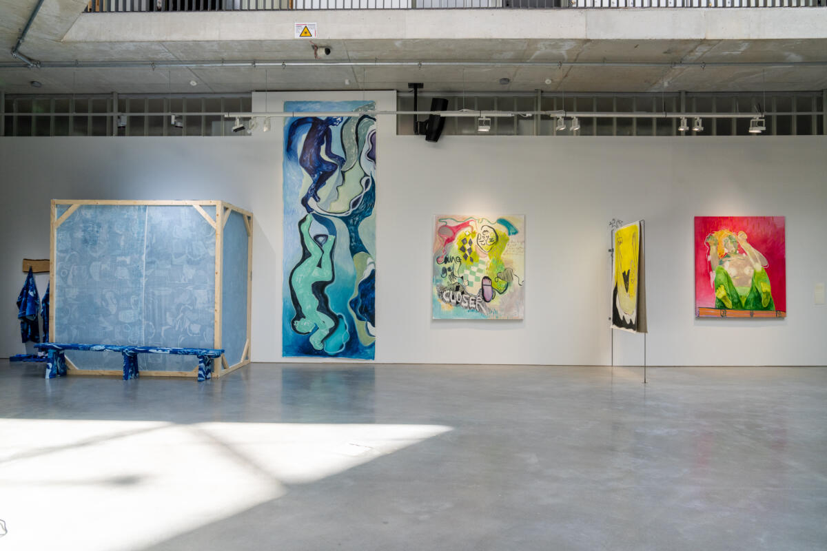 Artworks in an open lobby space.